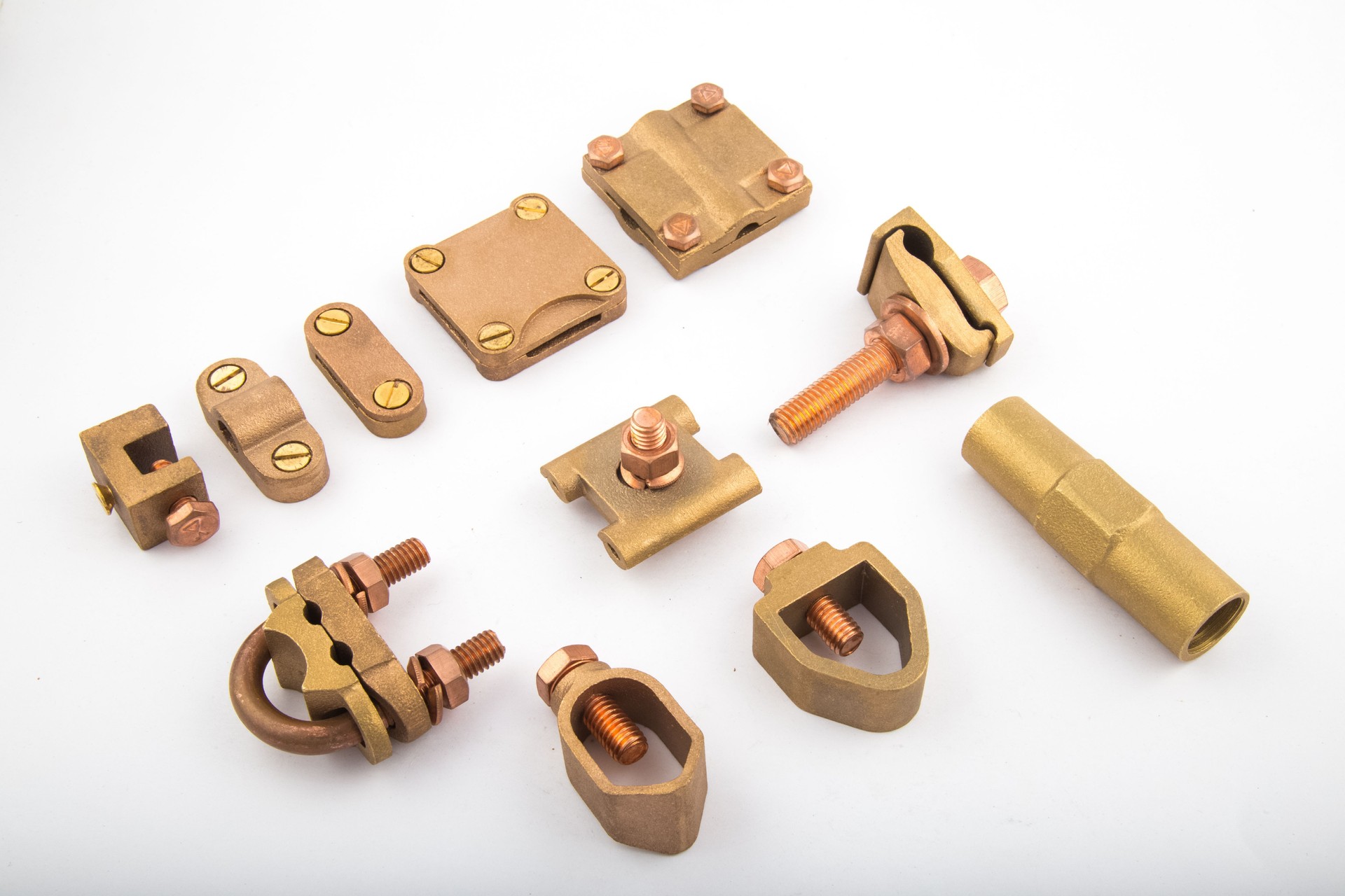 Variety of copper earthing accessories isolated on white background